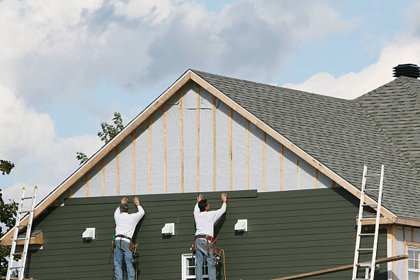 Professional Siding technician working in Kenly, NC